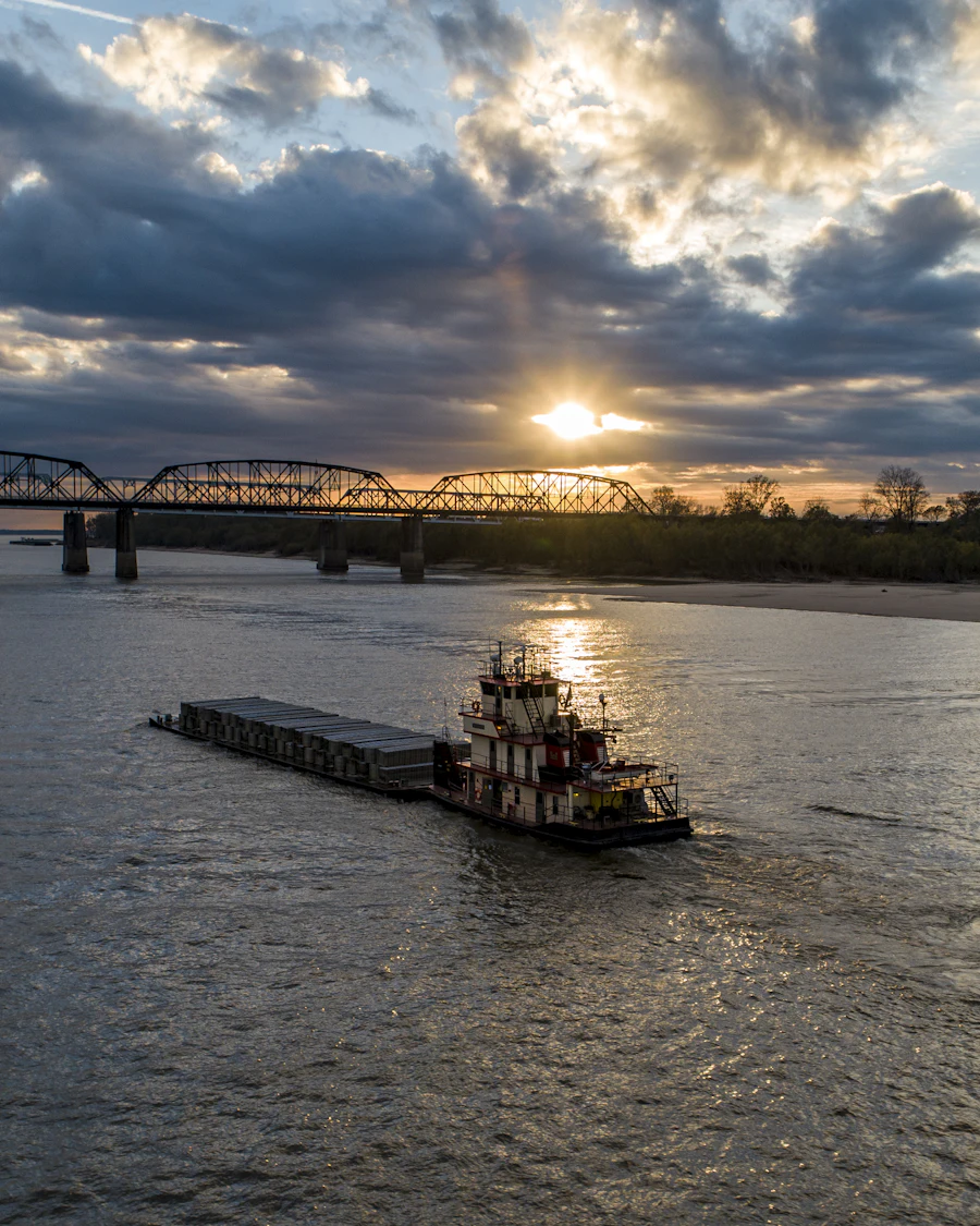 A towboat on the Mississippi River at sunset near Vicksburg, Mississippi