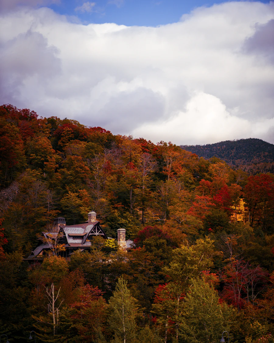 A mountain chalet surrounded by fall color in Vermont